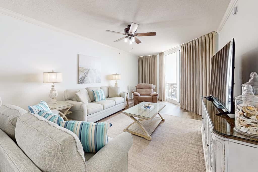 Gulf-front condo with pools, hot tub, beach access & views