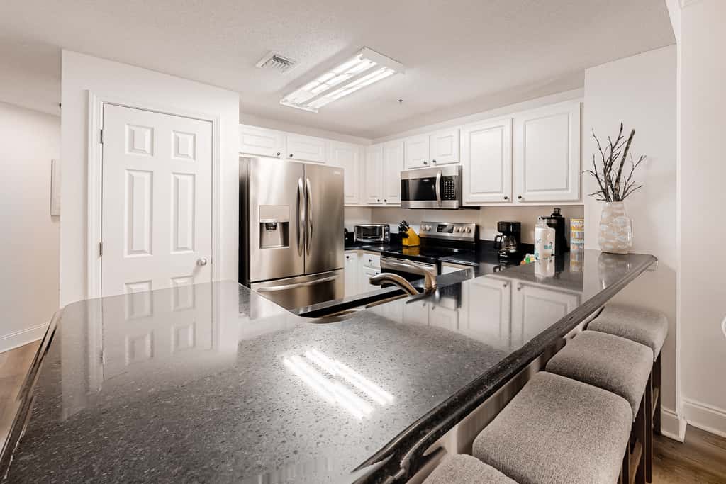 Gulf-front condo with pools, hot tub, beach access & views