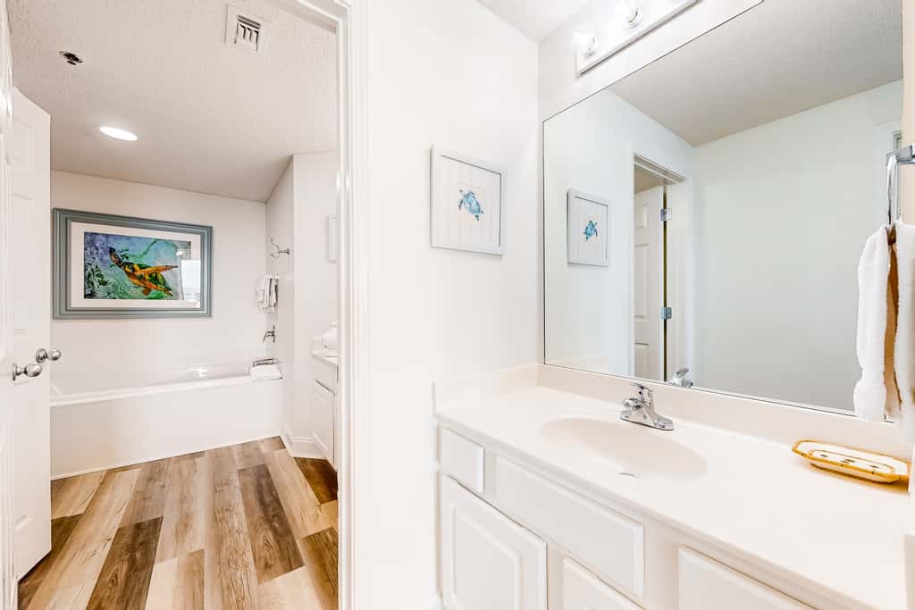Gulf-front condo with pools, hot tub, beach access & views