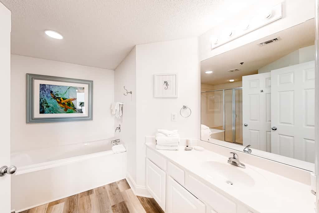 Gulf-front condo with pools, hot tub, beach access & views