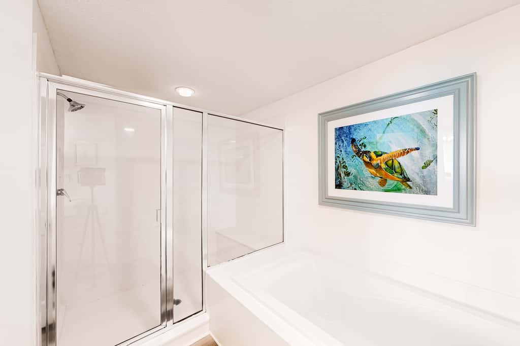 Gulf-front condo with pools, hot tub, beach access & views