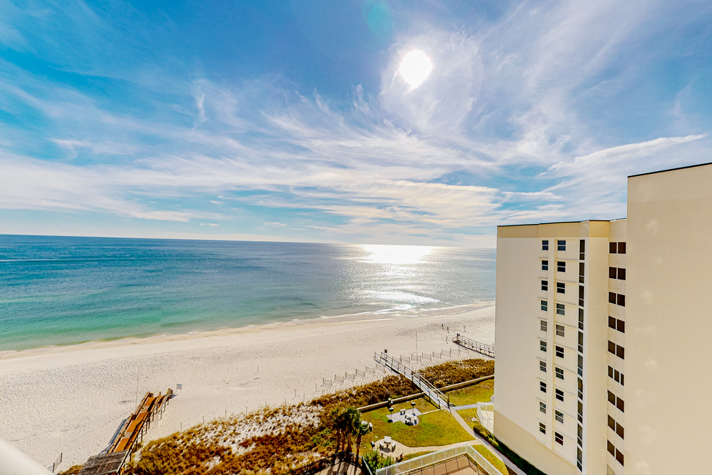 Gulf-front condo with pools, hot tub, beach access & views