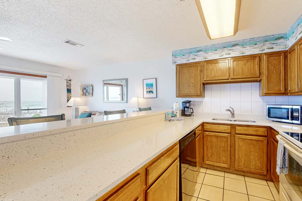 1st floor gulf front condo with amazing views, charcoal grills - walk to the beach
