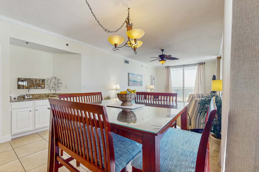 Gulf-front snowbird-friendly condo with pools, tennis, hot tub, balcony, gym, AC