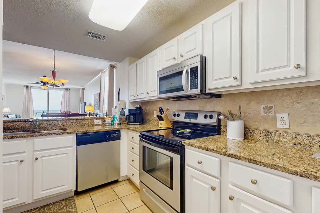 Gulf-front snowbird-friendly condo with pools, tennis, hot tub, balcony, gym, AC