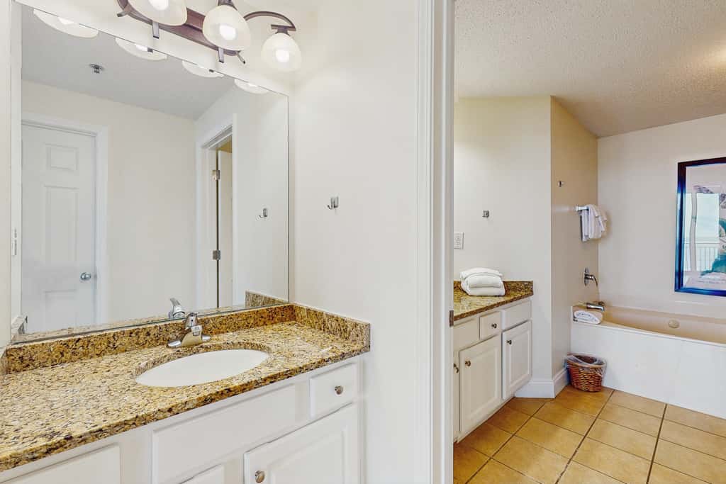Gulf-front snowbird-friendly condo with pools, tennis, hot tub, balcony, gym, AC