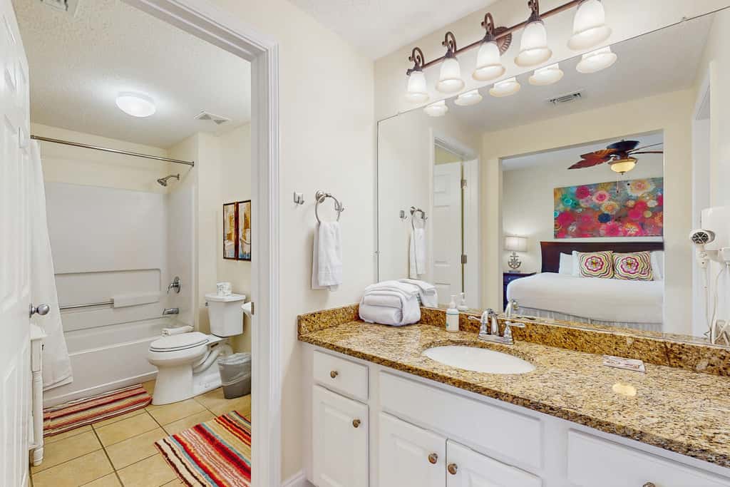 Gulf-front snowbird-friendly condo with pools, tennis, hot tub, balcony, gym, AC