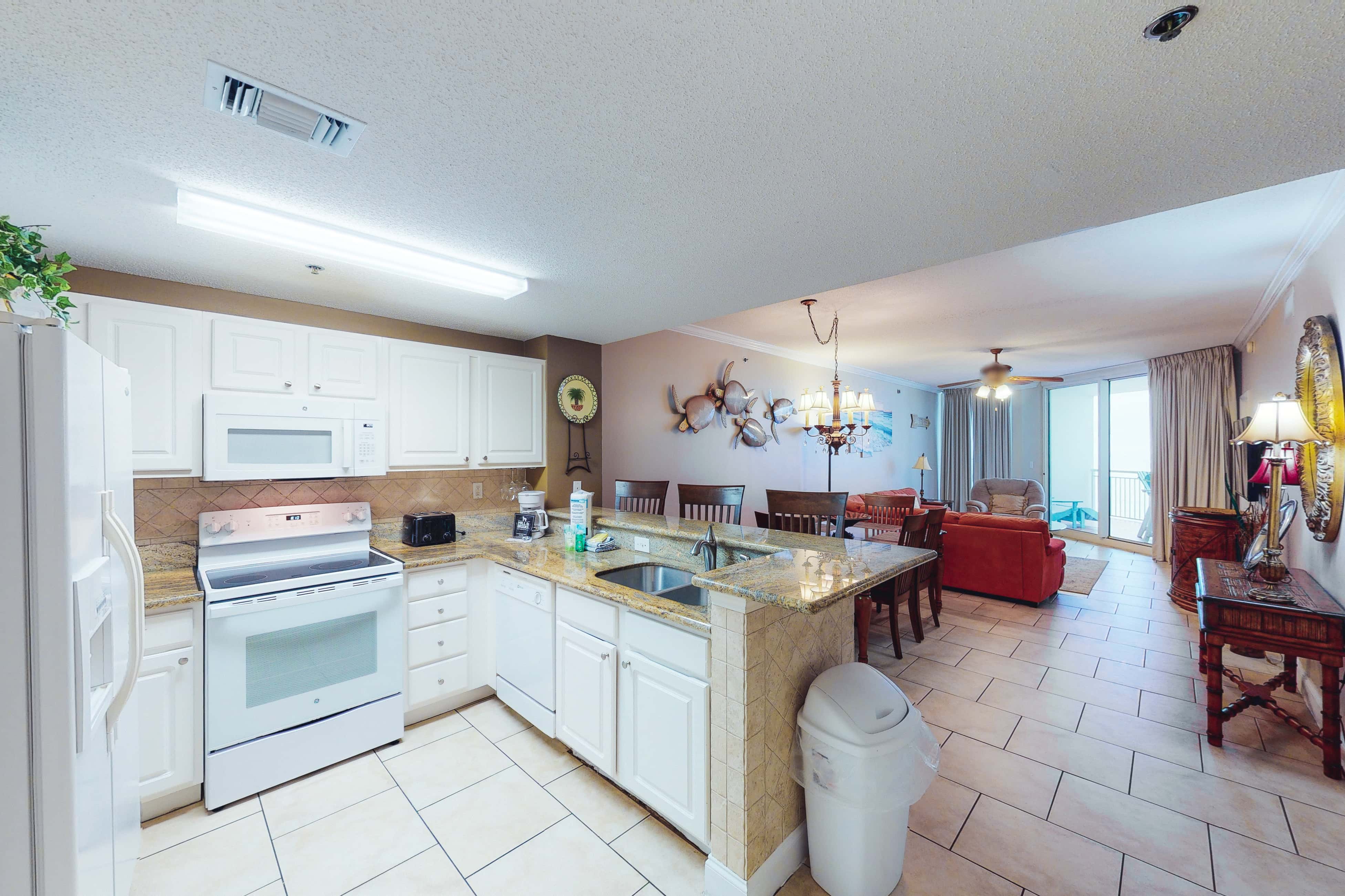 Coastal condo steps to beach with pools, hot tub, gym & amazing views