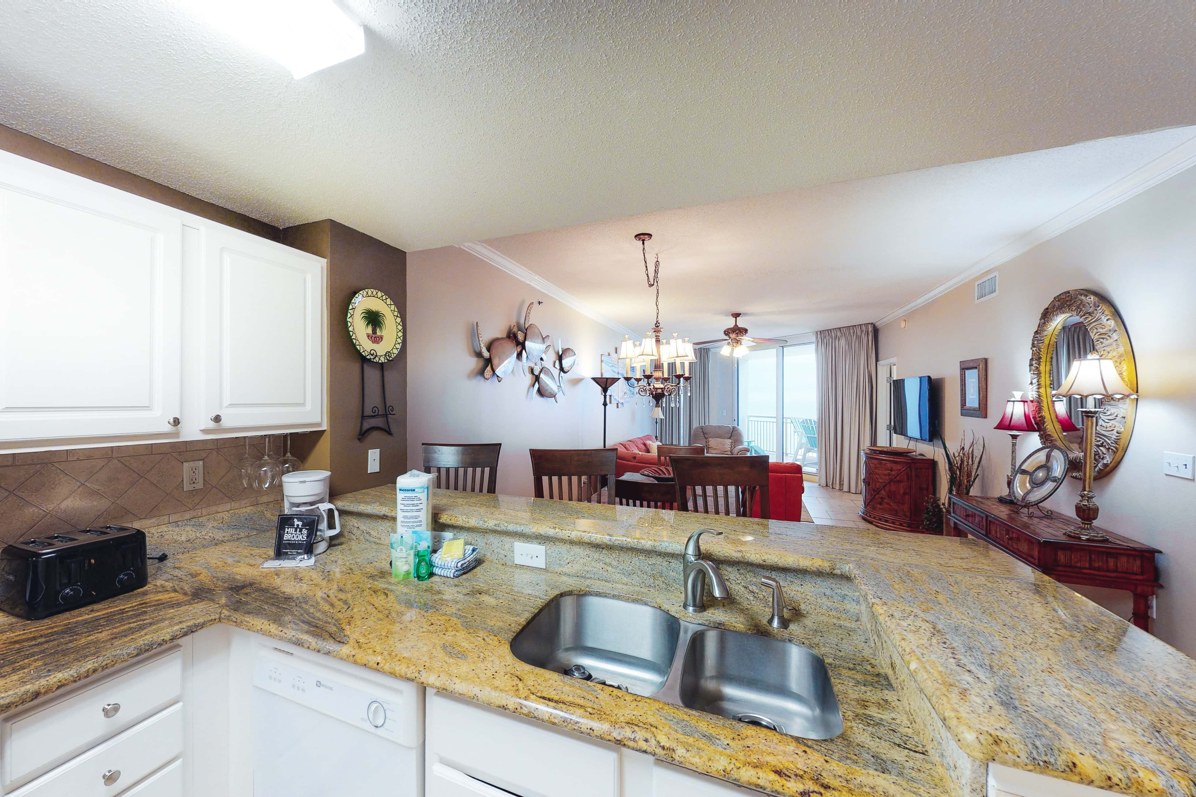 Coastal condo steps to beach with pools, hot tub, gym & amazing views