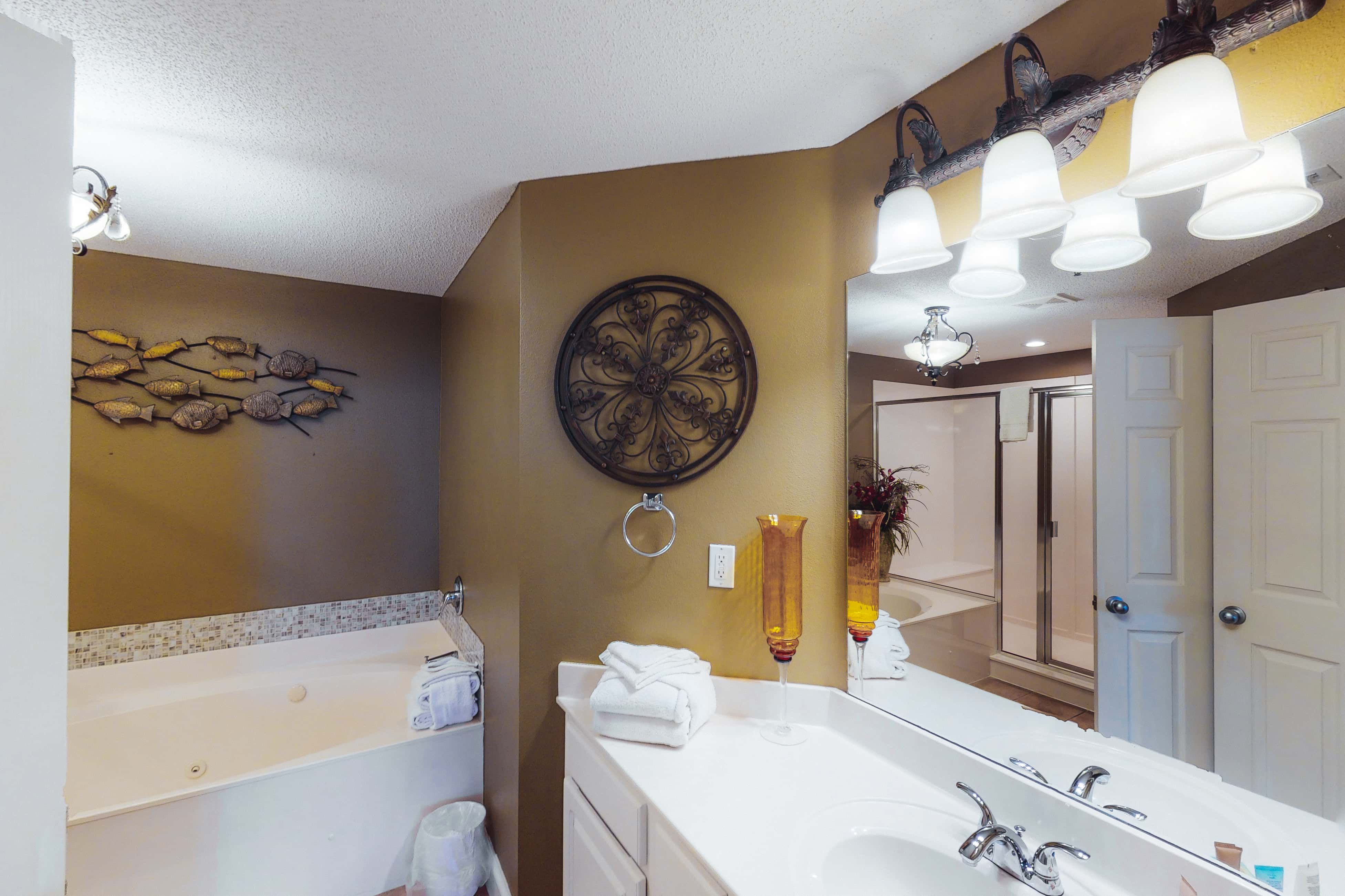 Coastal condo steps to beach with pools, hot tub, gym & amazing views