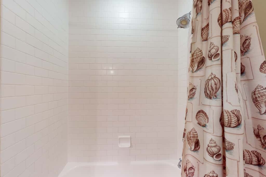 Beautiful condo with furnished balcony, pool & private beach access