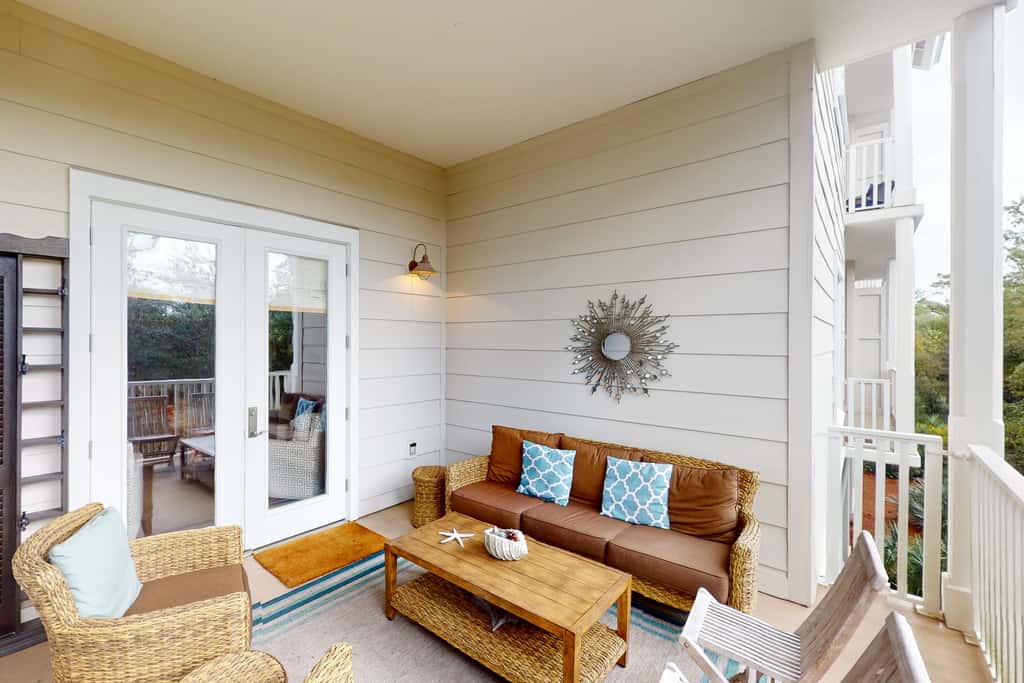 Beautiful condo with furnished balcony, pool & private beach access