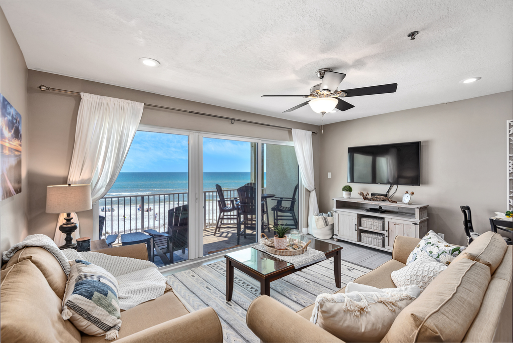 Stylish oceanfront condo w/ pool access, private W/D, ocean views, & central AC