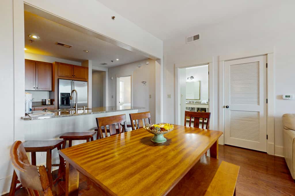Polished condo with balcony & pools - one block from the beach