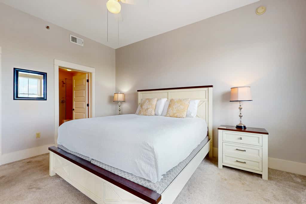 Polished condo with balcony & pools - one block from the beach