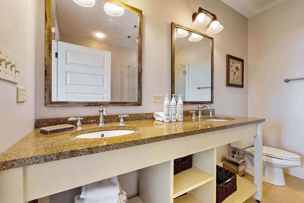 Polished condo with balcony & pools - one block from the beach