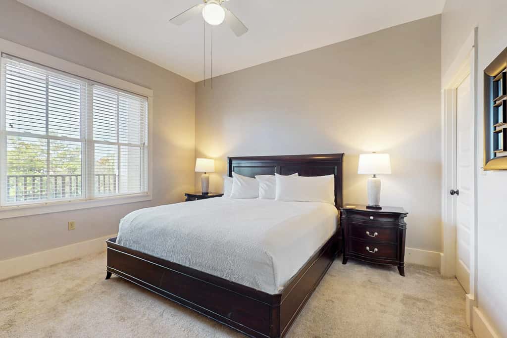 Polished condo with balcony & pools - one block from the beach