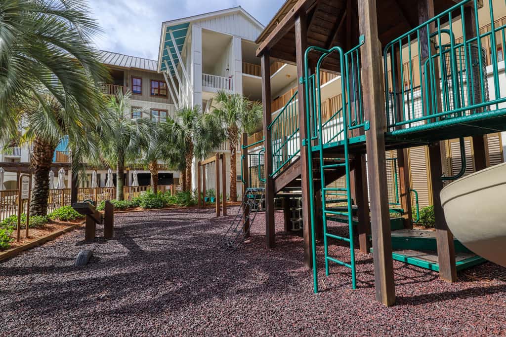 Polished condo with balcony & pools - one block from the beach