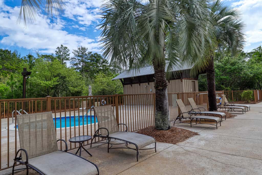 Polished condo with balcony & pools - one block from the beach