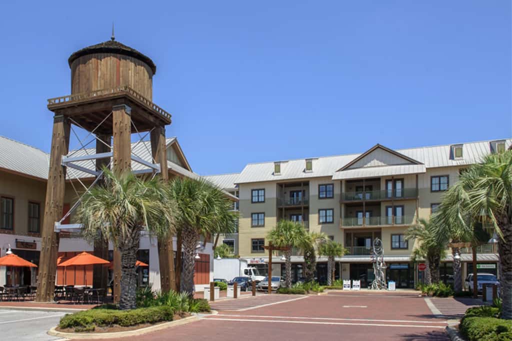 Polished condo with balcony & pools - one block from the beach
