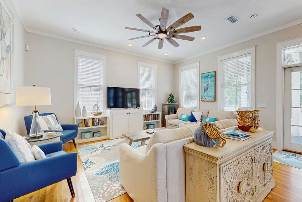 Coastal home with 2 community pools, bikes, front porch & balcony - near beach