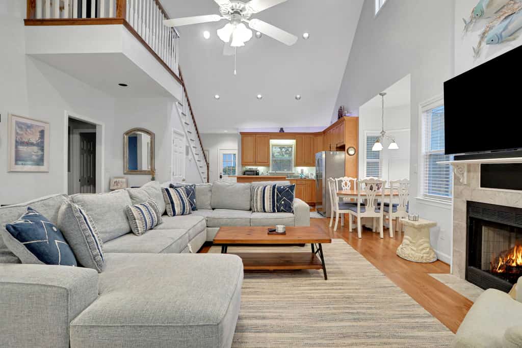 Centrally located home with enclosed yard, grill, high ceilings, smart TVs, & AC