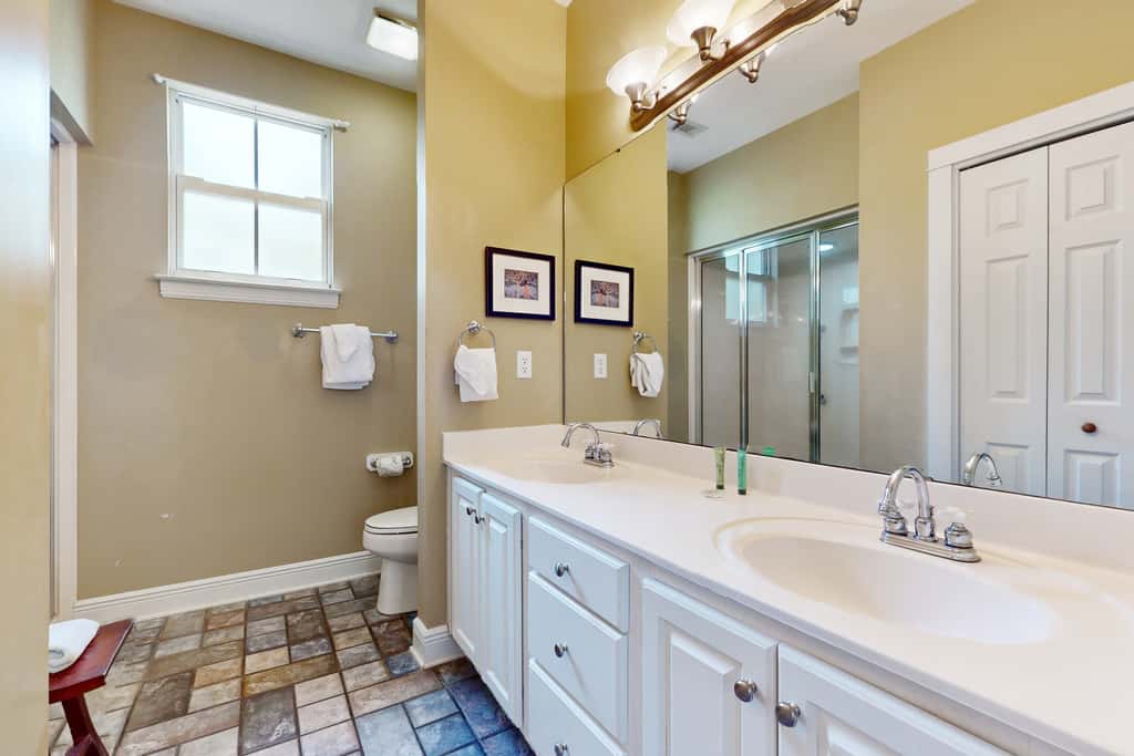 Coastal haven near the beach off scenic 30A with two pools & porch- dog-friendly