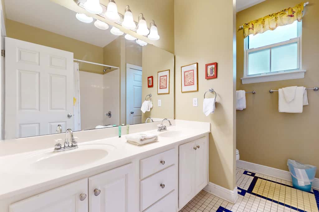 Coastal haven near the beach off scenic 30A with two pools & porch- dog-friendly