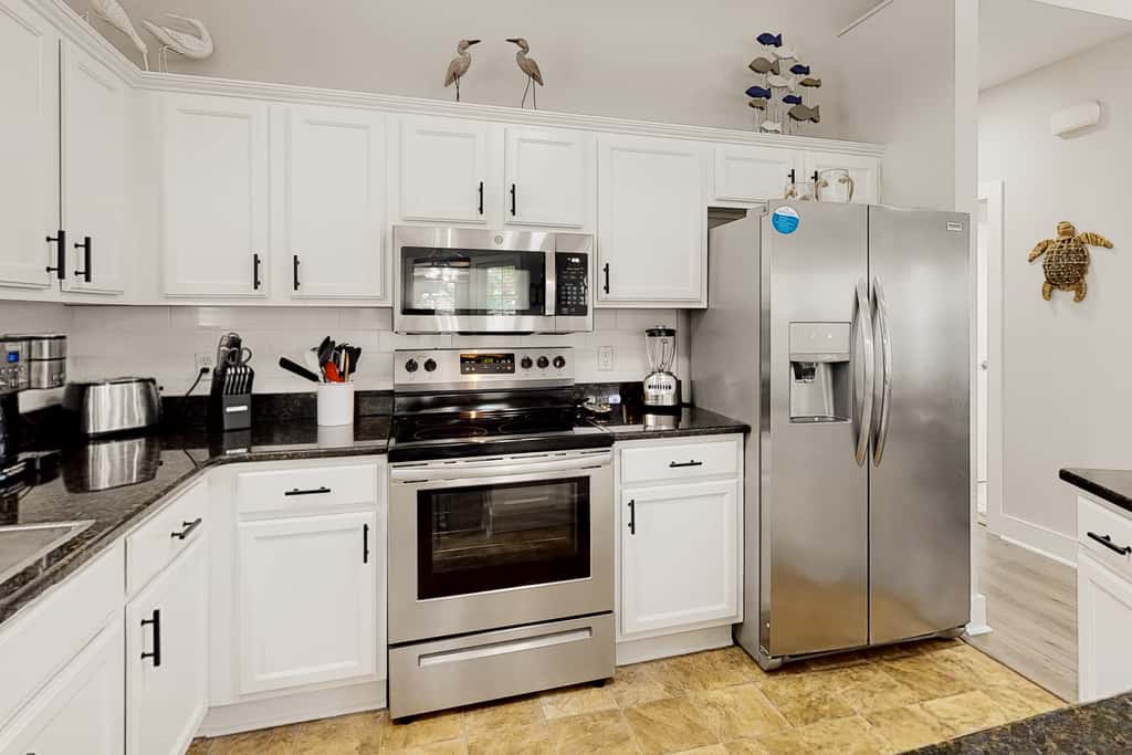 Dog-friendly home with pool, patio, & washer&dryer