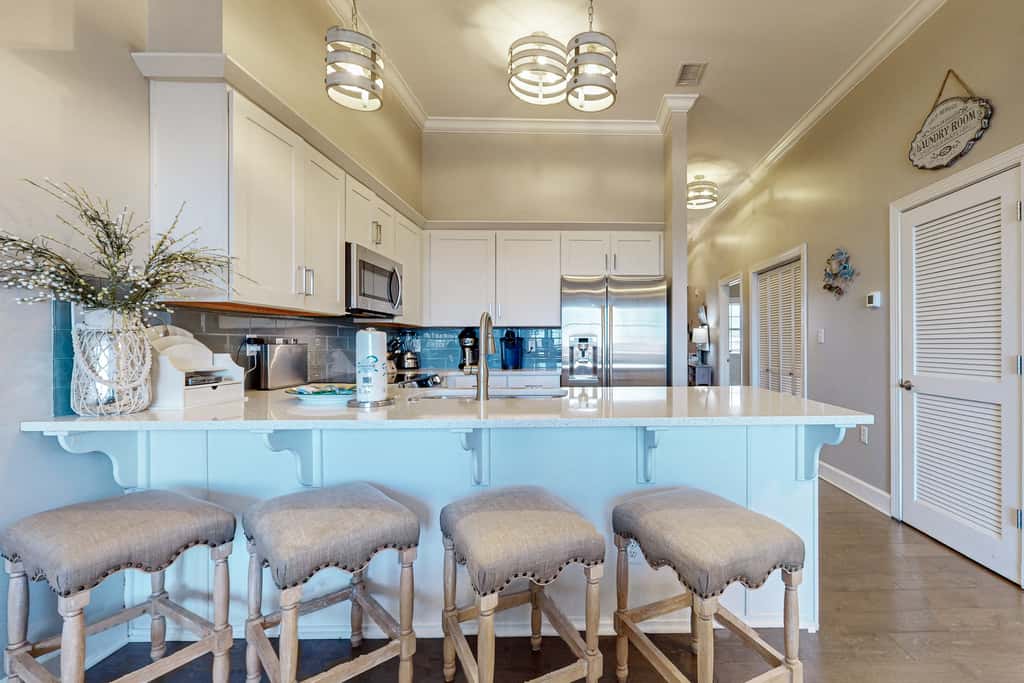 Elegant condo with 2 community pools, hot tub, & beach access across the road