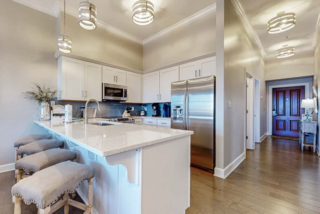 Elegant condo with 2 community pools, hot tub, & beach access across the road