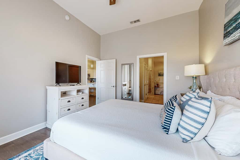 Elegant condo with 2 community pools, hot tub, & beach access across the road