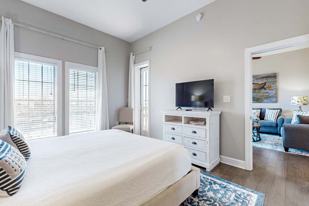 Elegant condo with 2 community pools, hot tub, & beach access across the road
