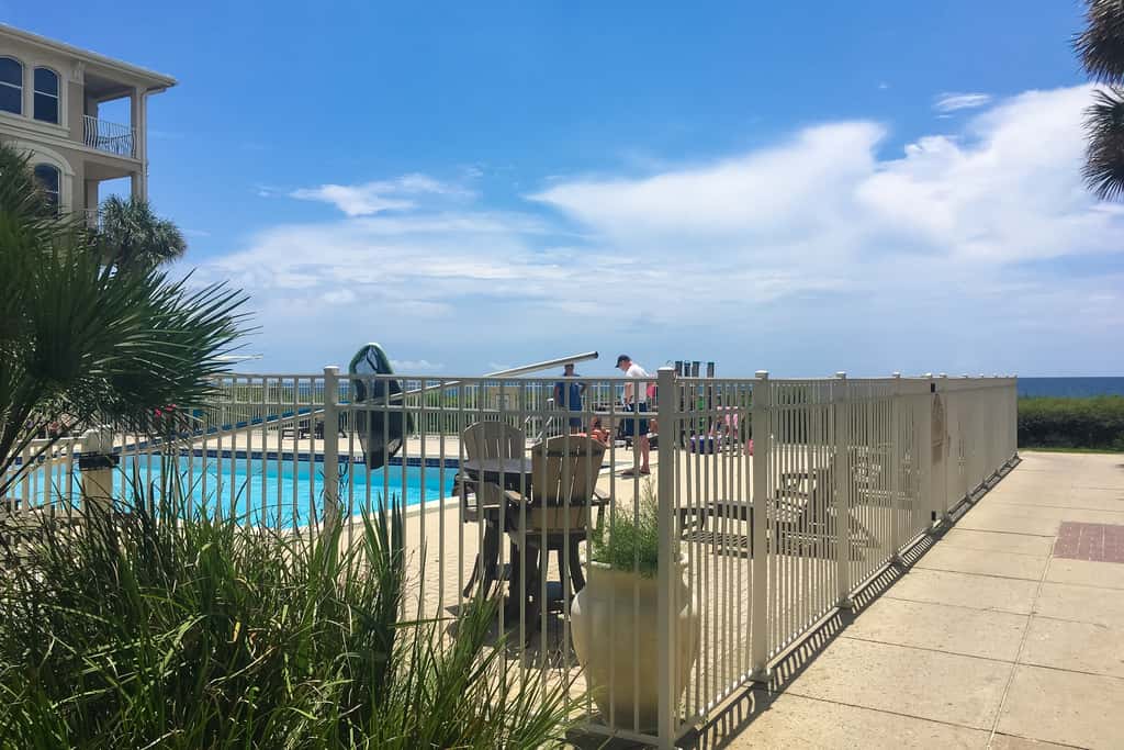 Elegant condo with 2 community pools, hot tub, & beach access across the road