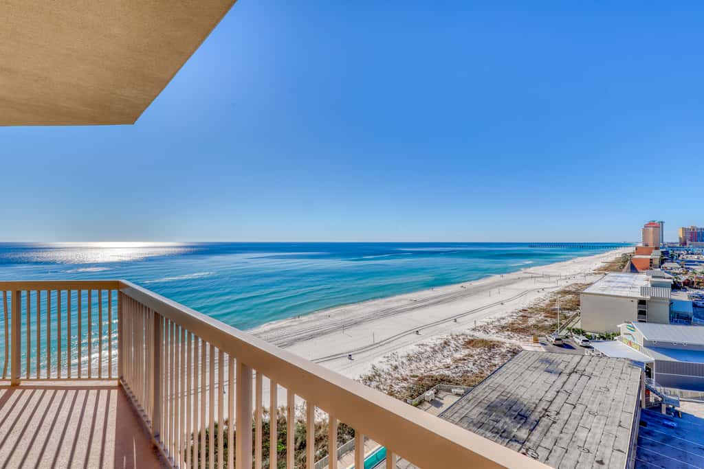 Deluxe beachfront condo with pool & hot tub - walk to the beach