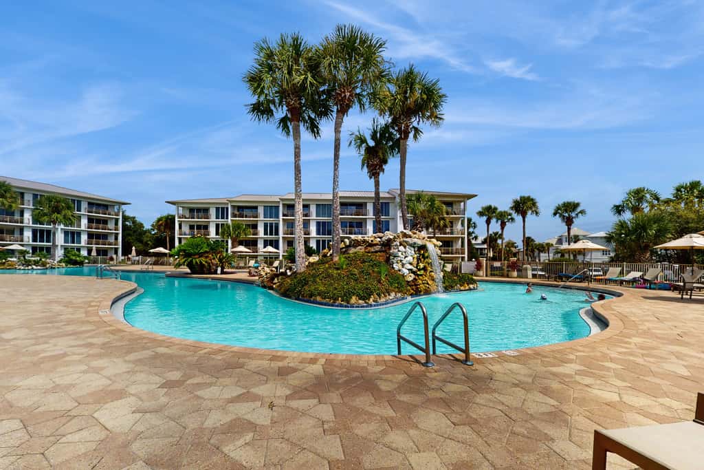 Elegant abode overlooking the pool with beach access, tennis & pickleball