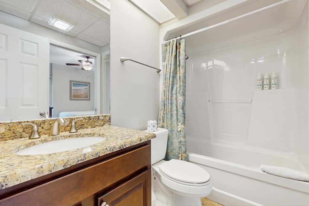 Elegant abode overlooking the pool with beach access, tennis & pickleball