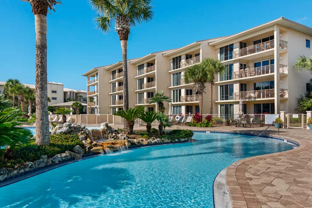 Elegant abode overlooking the pool with beach access, tennis & pickleball