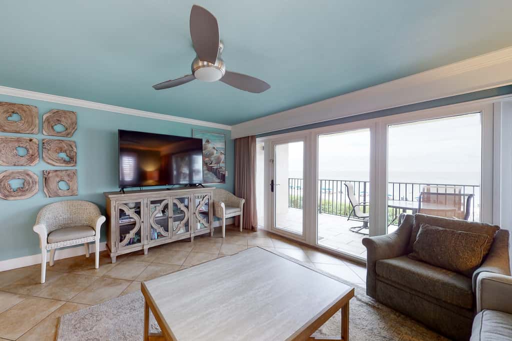 Gorgeous beachfront condo with a pool & private beach access