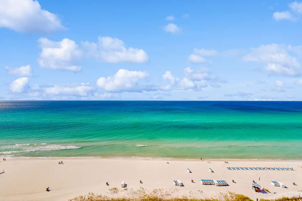 Gulf-front condo with balcony, beach views, pool, hot tub & gym