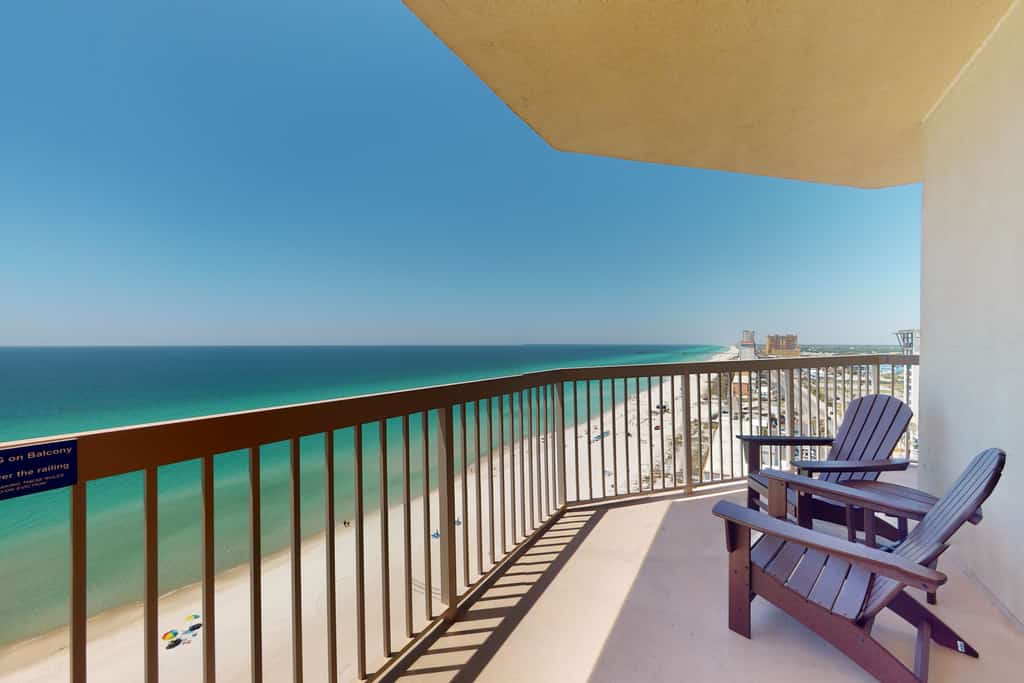 Tropical-themed 17th-floor condo with beachfront views, pools & gym