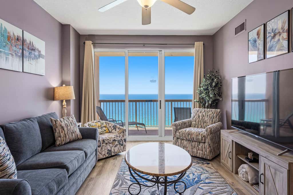 Elegant, beachfront condo with a furnished balcony, views & two pools