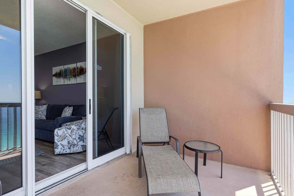 Elegant, beachfront condo with a furnished balcony, views & two pools