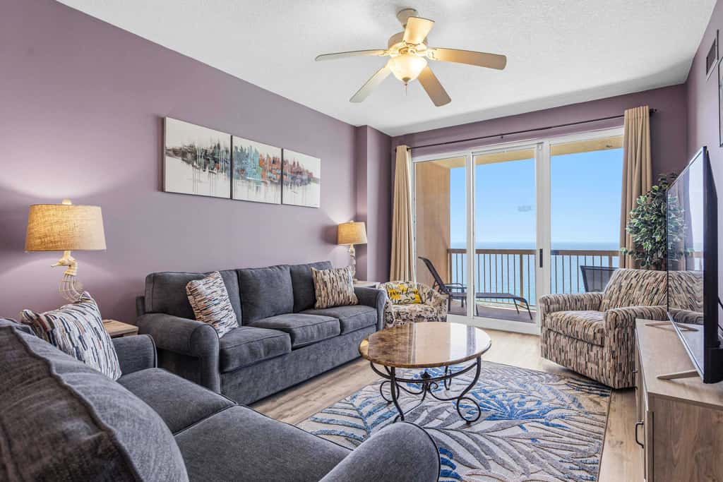 Elegant, beachfront condo with a furnished balcony, views & two pools