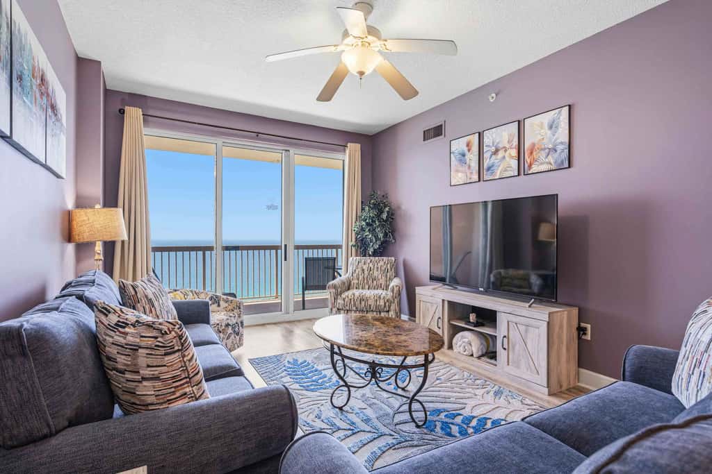 Elegant, beachfront condo with a furnished balcony, views & two pools
