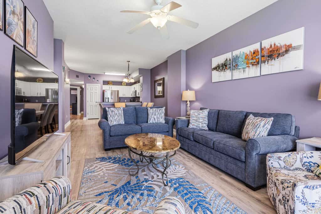 Elegant, beachfront condo with a furnished balcony, views & two pools