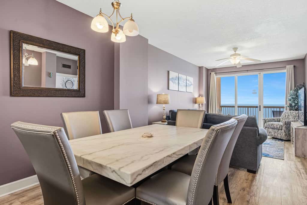 Elegant, beachfront condo with a furnished balcony, views & two pools