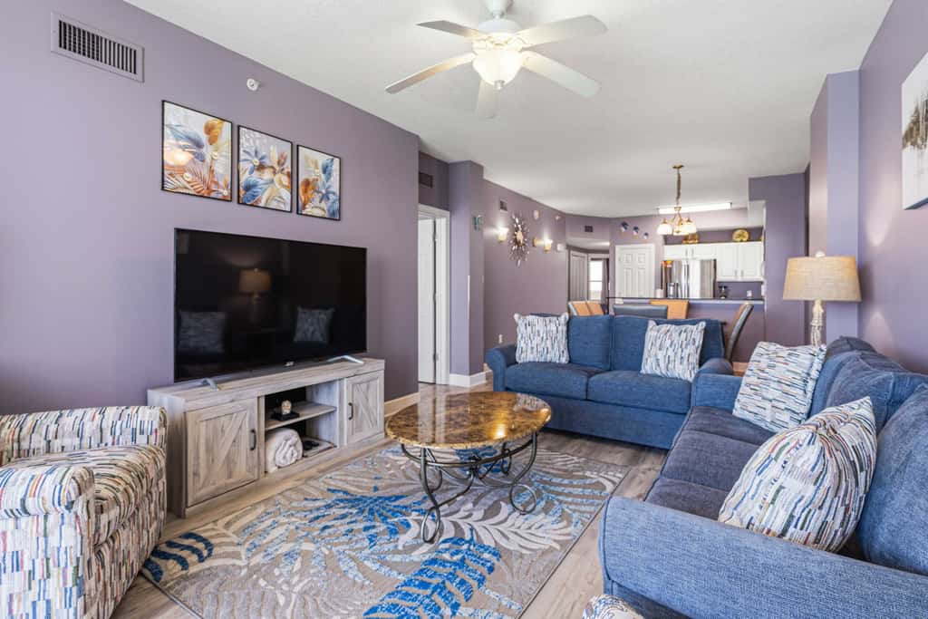 Elegant, beachfront condo with a furnished balcony, views & two pools