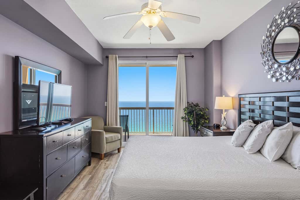Elegant, beachfront condo with a furnished balcony, views & two pools