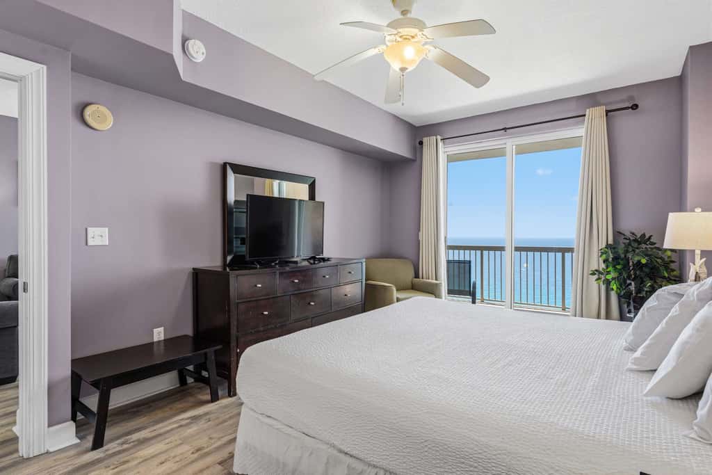 Elegant, beachfront condo with a furnished balcony, views & two pools